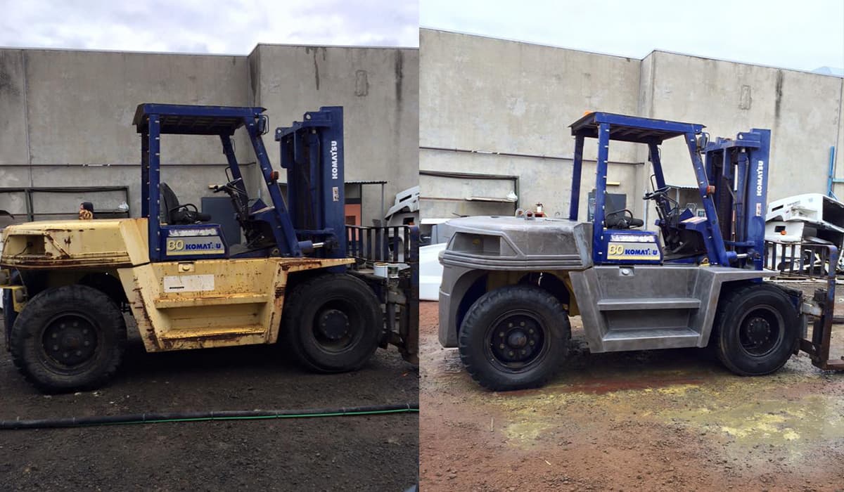Heavy forklift shown before and after surface preparation