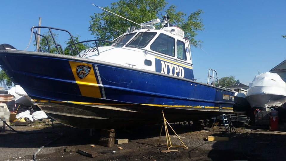 Work boat with its original painted finish