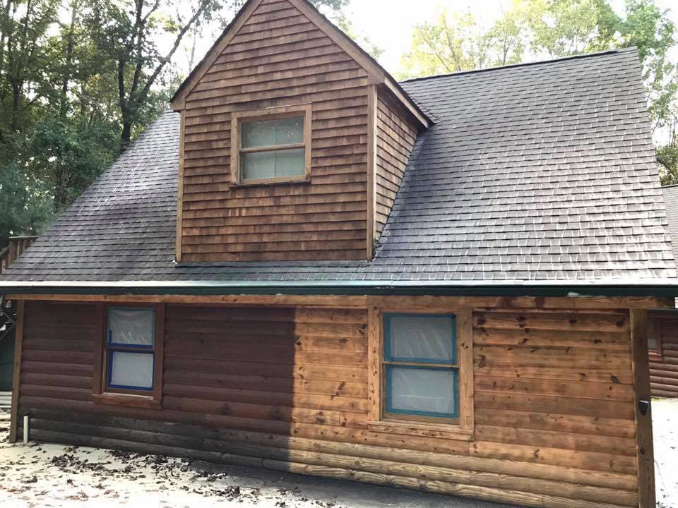 Wood-sided house shown before and after restoration