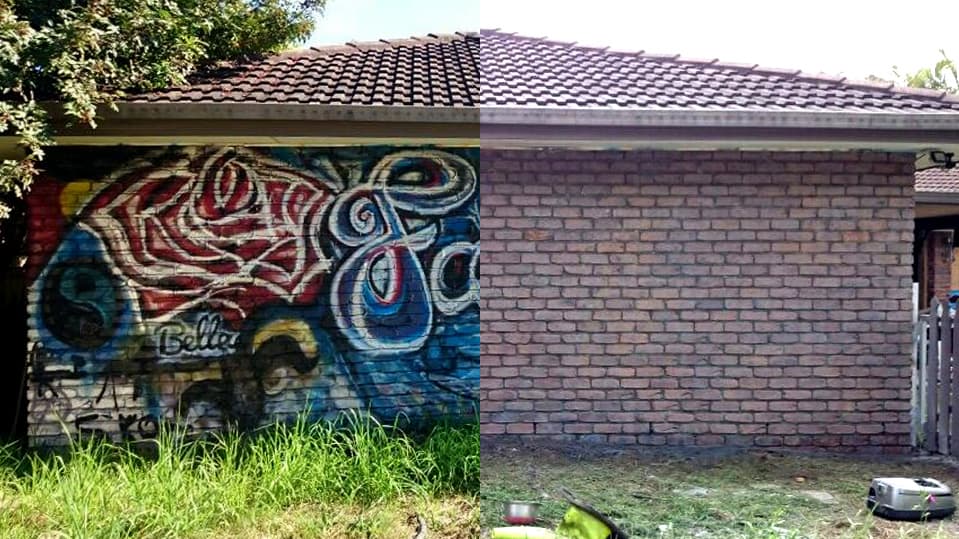 Graffiti-covered brick wall shown before and after removal